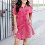 Woman with dark hair wearing a short-sleeve maroon denim midi dress.