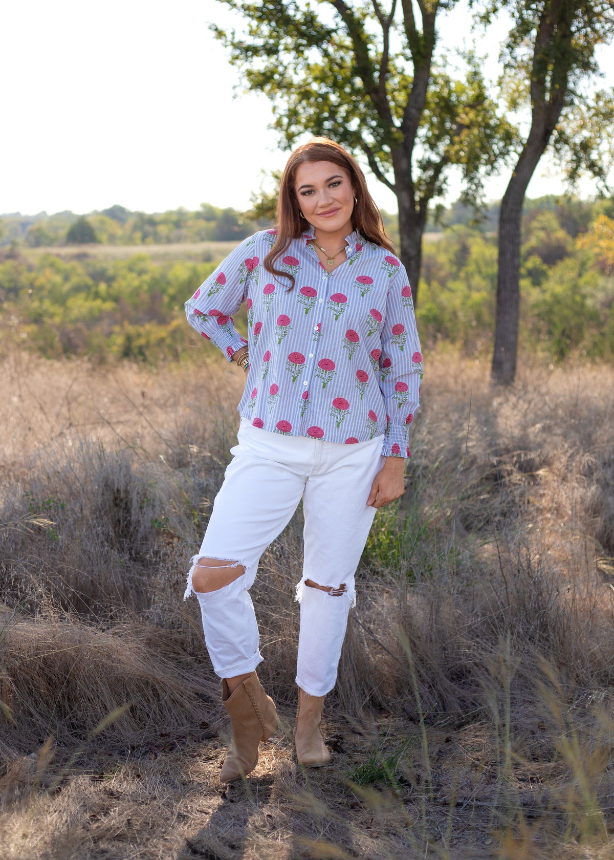 Front Renee Top blue and white stripe top with floral details.